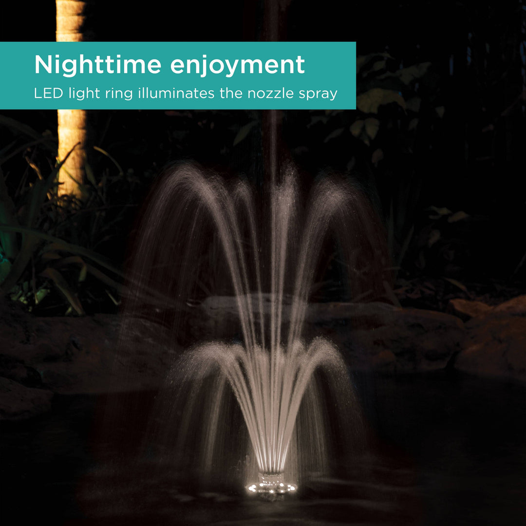 Floating Fountain shown at night with the lights shining