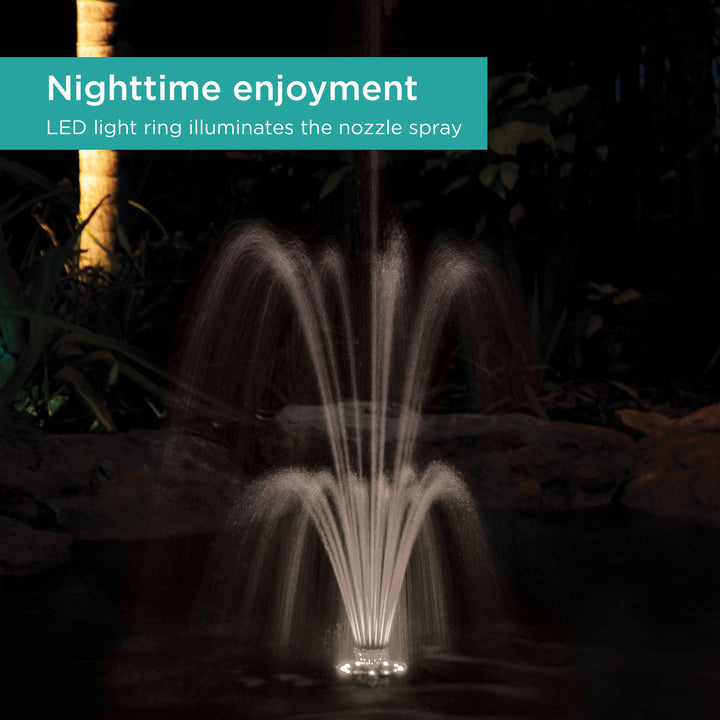 Floating Fountain shown at night with the lights shining